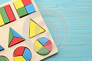 colorful wooden cubes on blue wooden background. Top view. Toys in the table