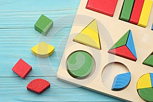 colorful wooden cubes on blue wooden background. Top view. Toys in the table