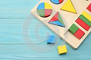 colorful wooden cubes on blue wooden background. Top view. Toys in the table