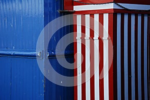 Colorful wooden houses, cabins on the English beach.