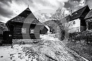 Colorful wooden houses in Vlkolinec, colorless