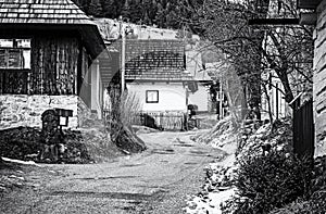 Colorful wooden houses in Vlkolinec, colorless