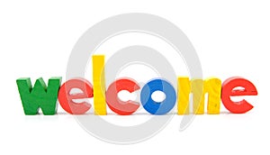 Colorful wooden letters with the word welcome