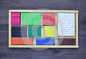 Colorful wooden rectangles for math Cuisenaire rods. Wood Montessori material for math Cuisenaire rods