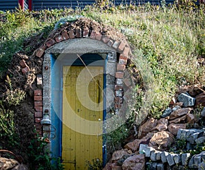 Colorful wooden root cellar door