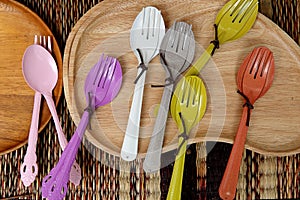 Colorful wooden spoon and forks