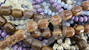 Colorful wooden and stone rosaries