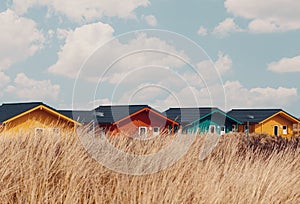 Colorful wooden tiny houses on the island