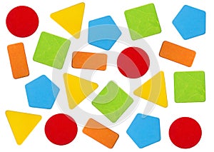 Colorful wooden toy blocks background in geometric shapes.