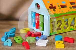 Colorful wooden toys in playroom