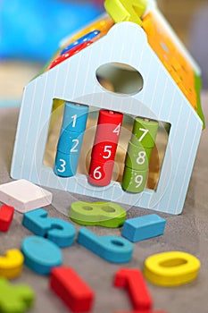 Colorful wooden toys in playroom