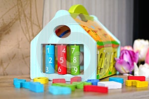 Colorful wooden toys in playroom