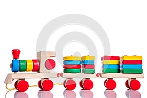 Colorful wooden train toy over white