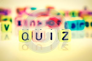 Colorful word cube of QUIZ