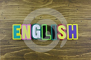 The colorful word `English` over the wooden board.