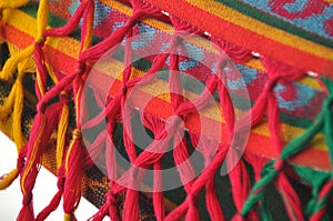 Colorful, woven hammock hanging on the veranda overlooking the Gulf of Carribean in Bocas del Toro