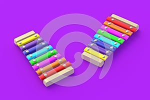 Colorful xylophones on violet background. Kids toy. Preschool education. Musical instrument