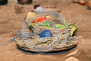 Colorful yarn balls in traditional baskets in Andes Mountains near Cusco Peru