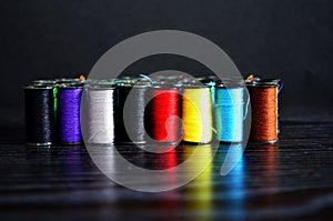 Colorful yarn for sewing on the spool.