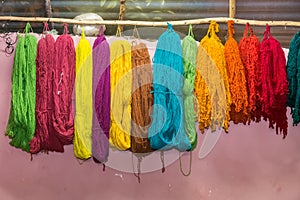 Colorful yarns traditionally made of Llama and Alpaca in Andes Mountains near Cusco Peru