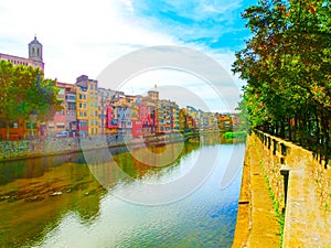 Colorful yellow and orange houses in Girona, Catalonia, Spain.