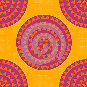 Colorful yellow, pink, blue grunge halftone ethnic tribal native round mandala seamless pattern.