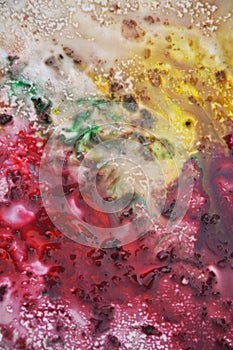 Colorful yellow pink bright colors and hues. Abstract wet paint background. Painting spots.