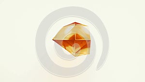 Colorful yellow shiny polyhedron crystal arbitrarily transforming on white background. Quality motion dynamic animated