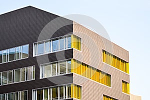 Colorful yellow windows in a modern architecture building.