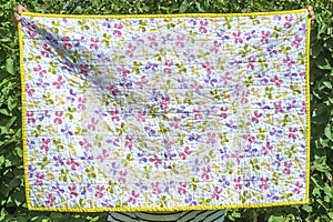 Colorfull baby quilt thirty nine by 27 inches back