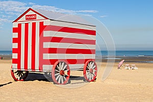 Colorfull carries changing stalls on North sea beach, De-Panne, Belgium