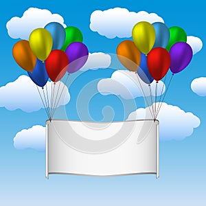 Colorfull helium balloons and banner in sky