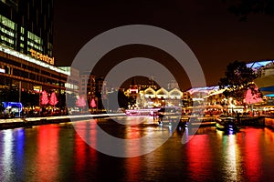 Colorfull Night scene of Singapore river, Clark query