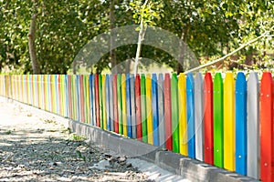 Colorfull painted wood fence with shallow DOF