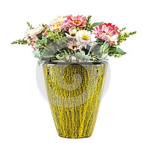 Colorfull plastic flowers in potery jar photo