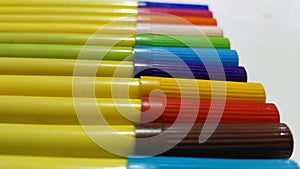 Colorfull sketch pens or markers on white isolated background