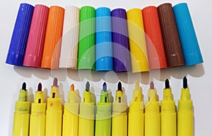 Colorfull sketch pens or markers on white isolated background