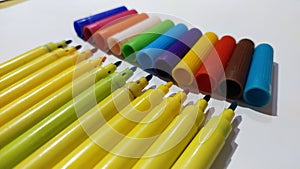 Colorfull sketch pens or markers on white isolated background