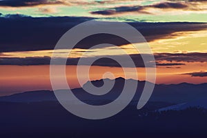 Colorfully clouds at sunset in top of the mountain on winter time at high altitudes