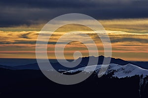 Colorfully clouds at sunset in top of the mountain on winter time at high altitudes