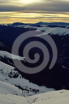 Colorfully clouds at sunset in top of the mountain on winter time at high altitudes