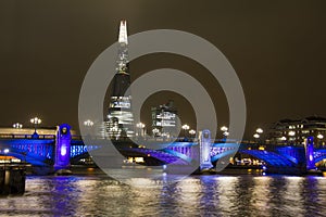 Southwark Bridge and the Shard in London photo