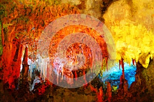Colorfully lit stalactite cave in Mallorca.Painted
