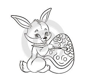 Coloring book Cute easter bunny painting an easter egg with a brush.Vector illustration in a flat cartoon style, black