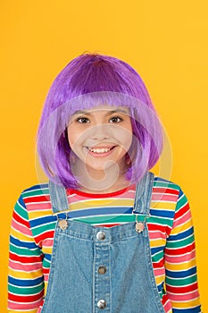 Coloring childs hair great way upgrade costume. Change color. Fantasy hair trend. Kid girl with bright vibrant hairstyle