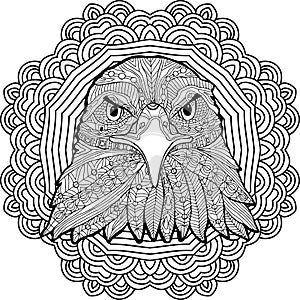 Coloring page for adults. Stern eagle on a background of a circular mandala pattern.