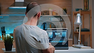 Colorist using editing software working remotely