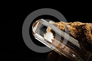 colorless Topaz on matrix