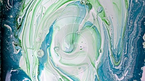 The colors of the aqueous ink are translucent. Abstract multicolored marble texture background