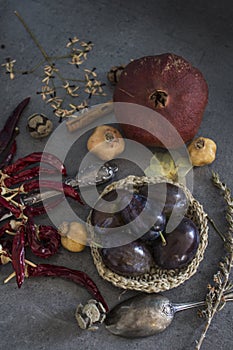Colors of autumn. Still life with dried fruits and flowers.